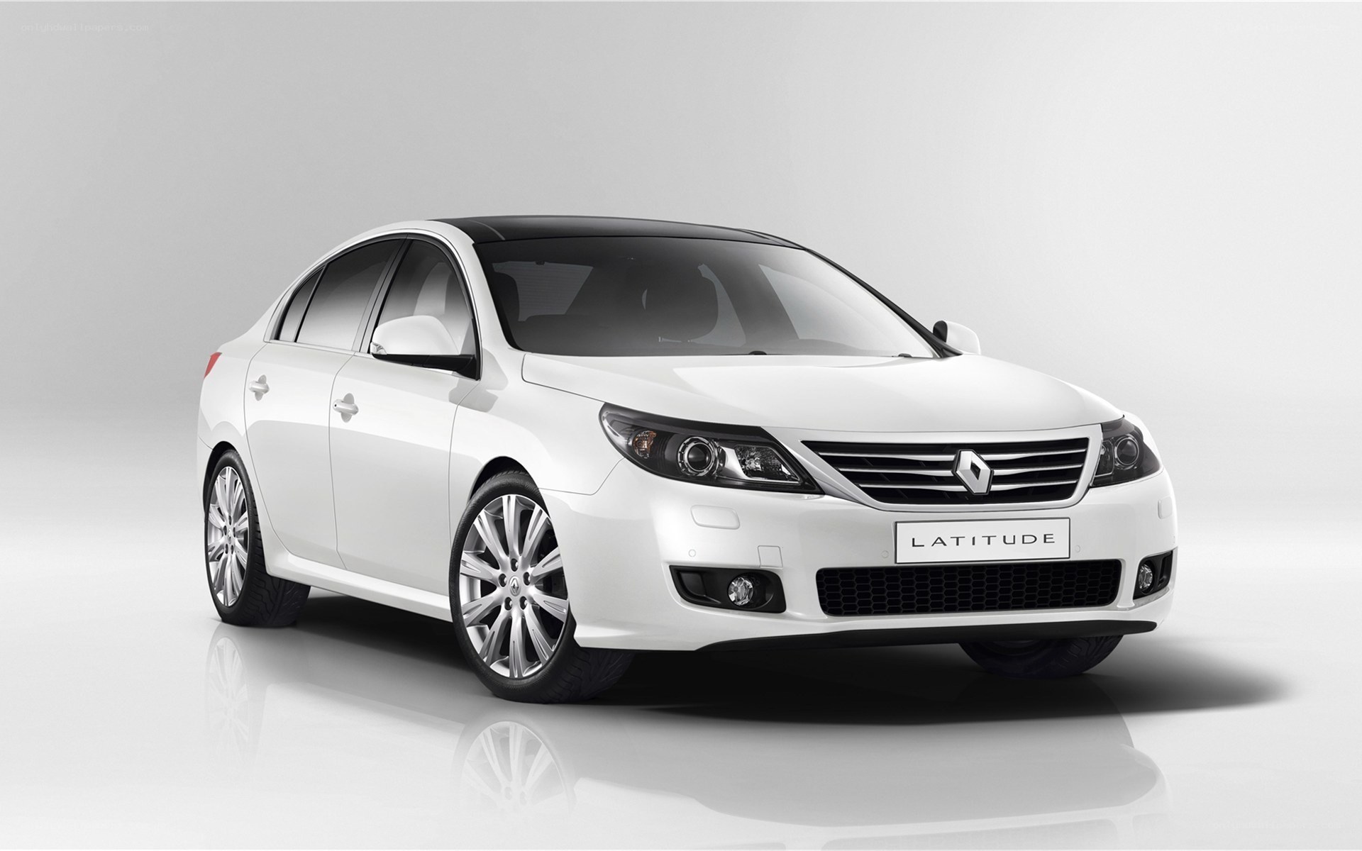 White Renault Latitude sedan