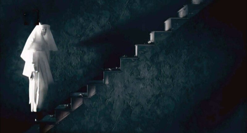 White-robed Figure on Stairs
