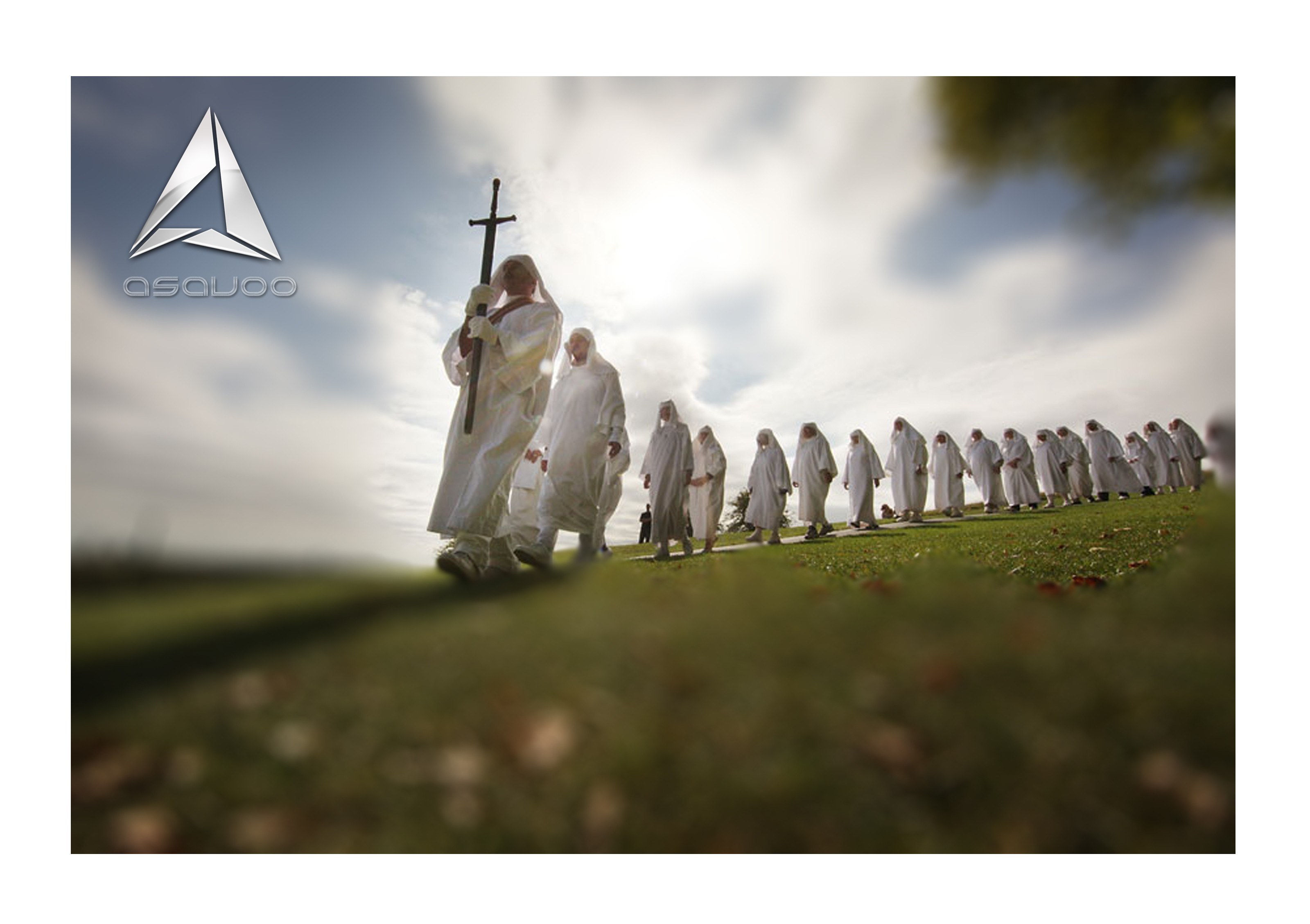 White-robed procession with staff