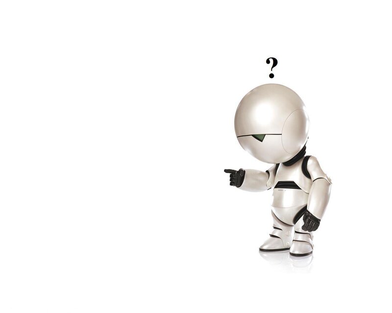 White Robot Figurine — Curious