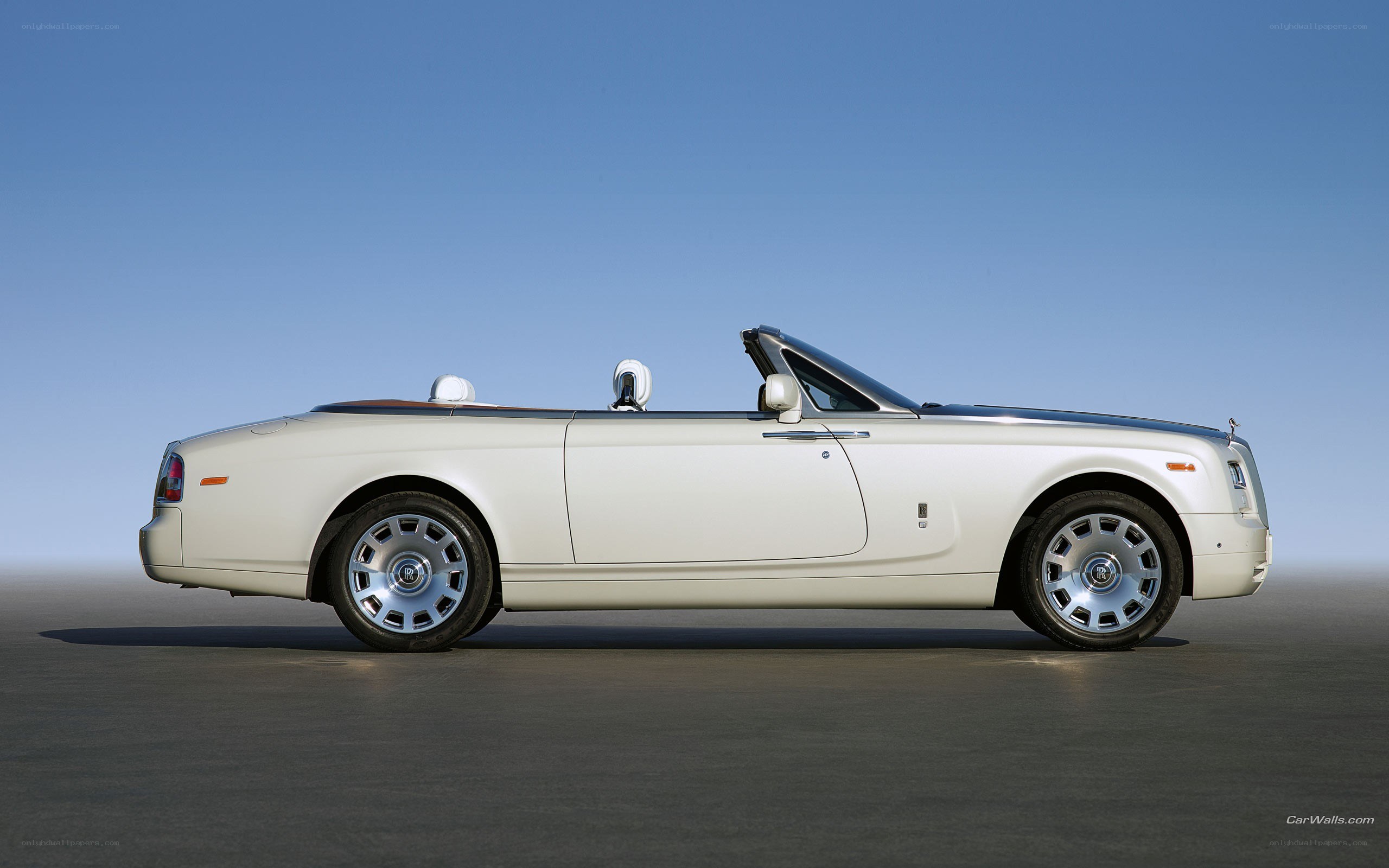 white rolls-royce convertible