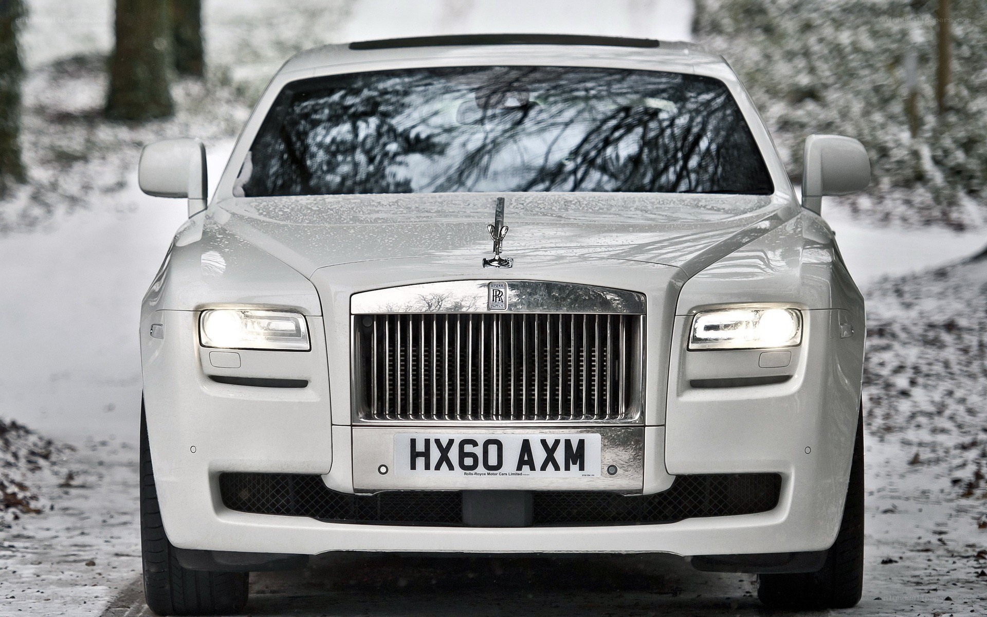 White Rolls-Royce in snow