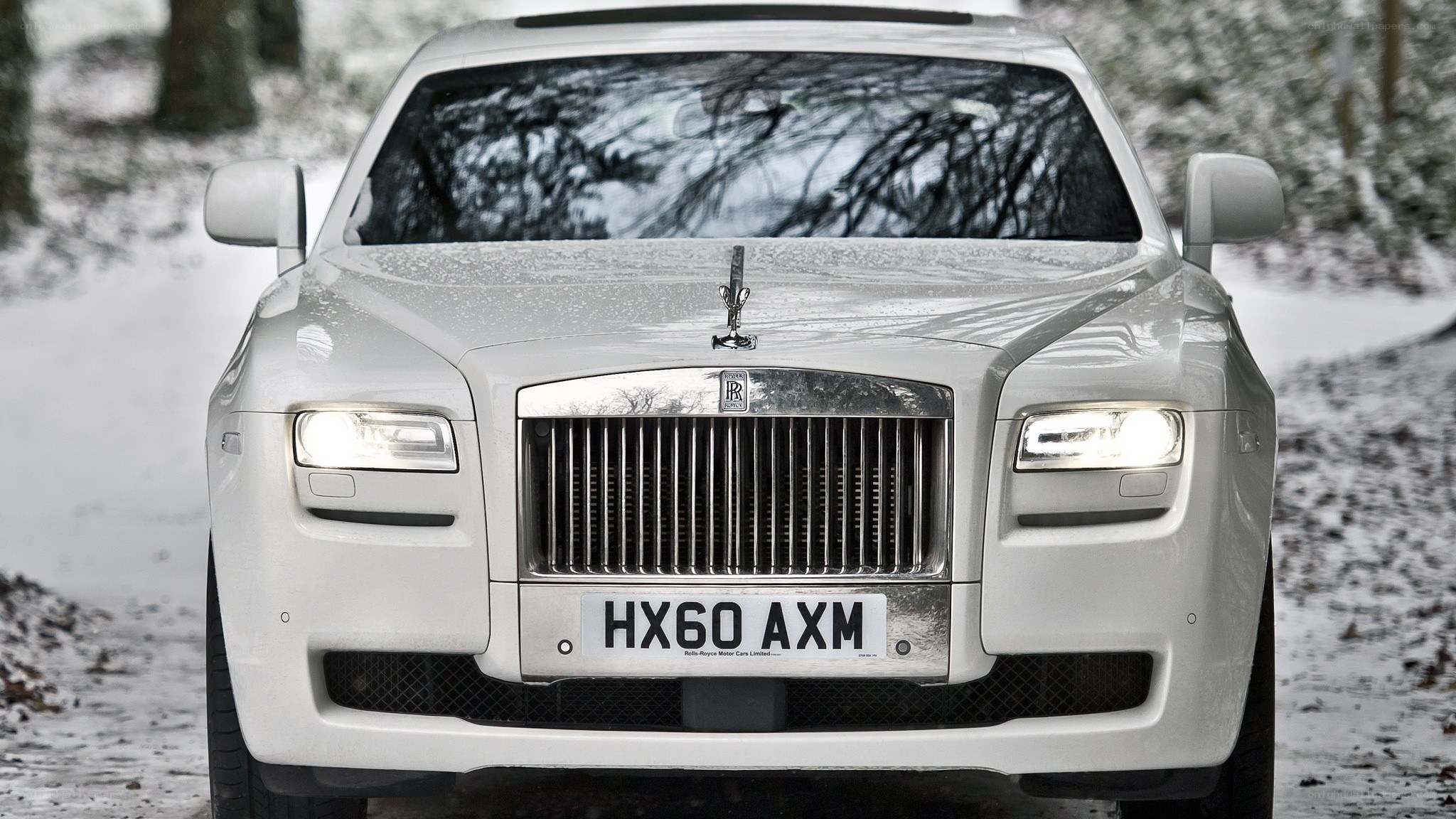 White Rolls-Royce in snow