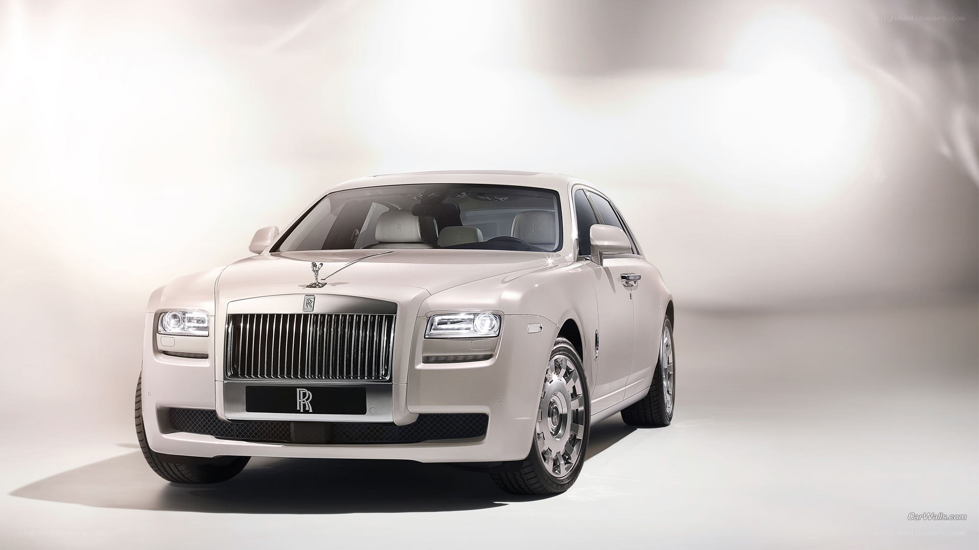 white rolls-royce luxury car