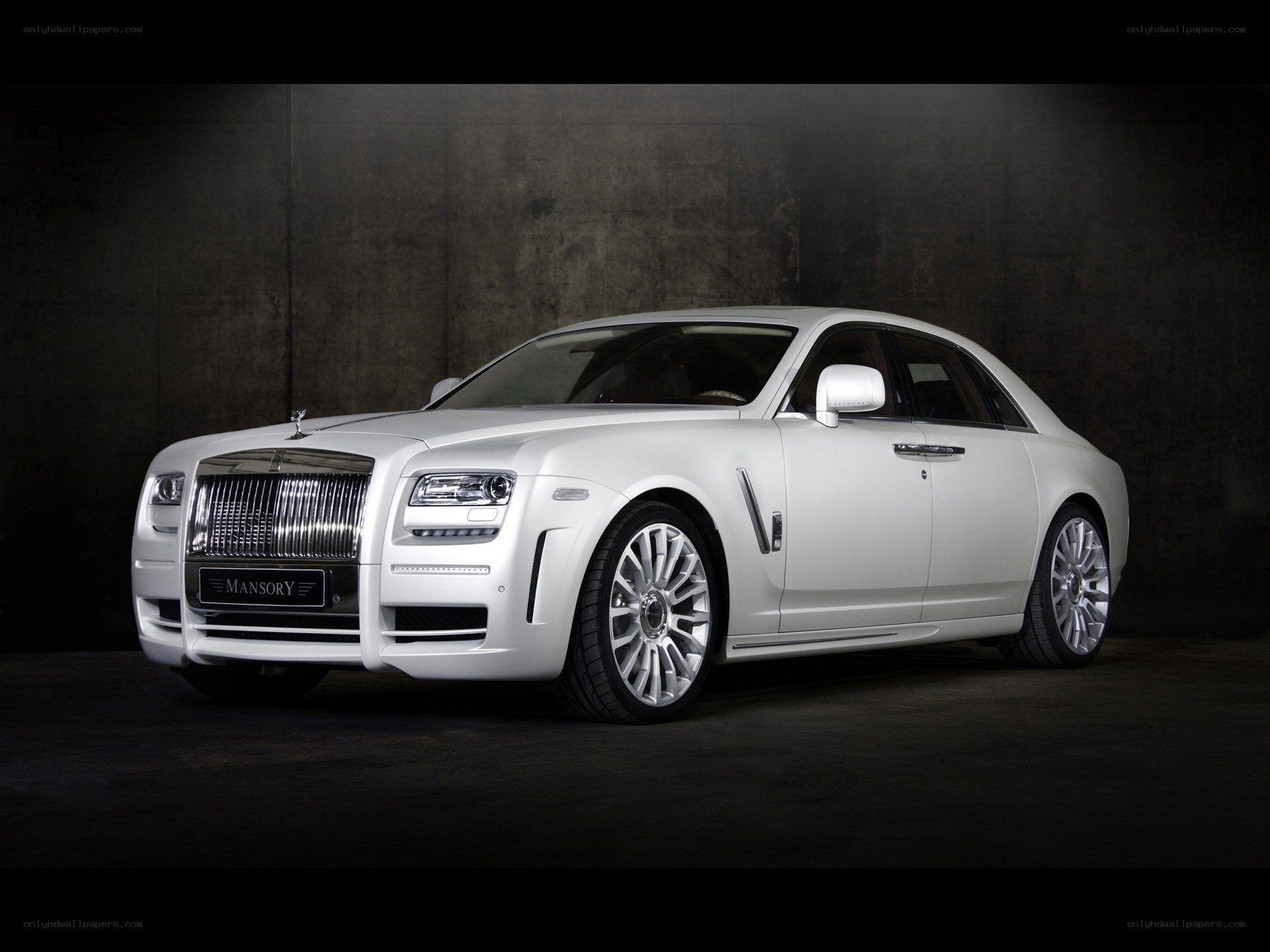 White Rolls-Royce luxury sedan