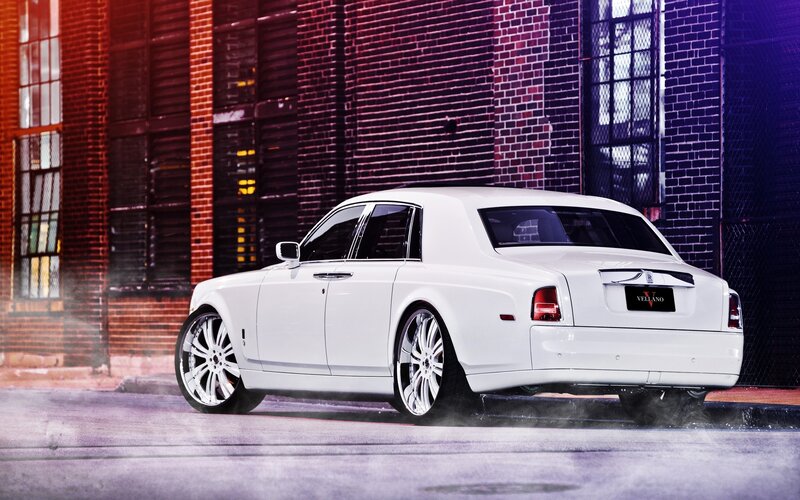White Rolls-Royce on city street
