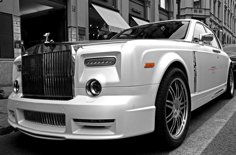 White Rolls-Royce on city street