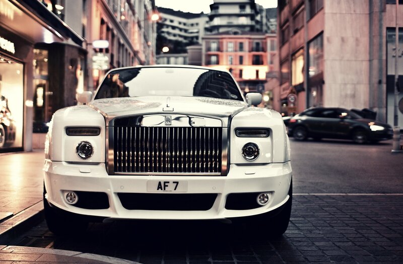 White Rolls-Royce on city street
