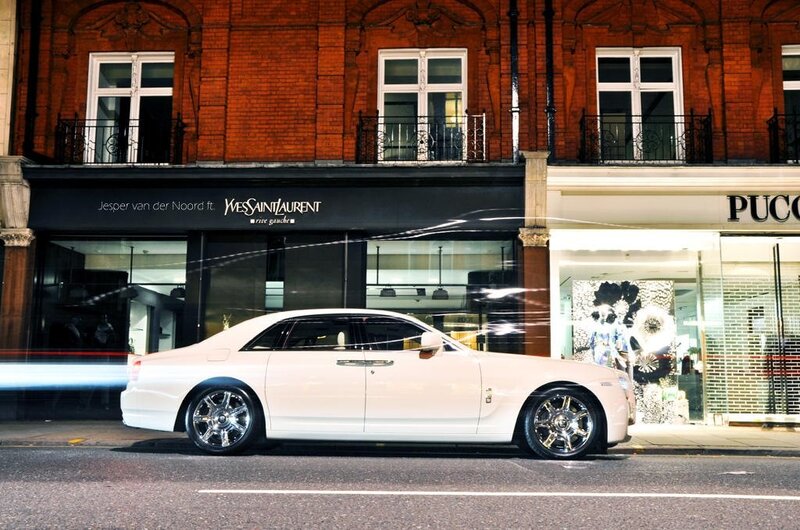 White Rolls-Royce on city street