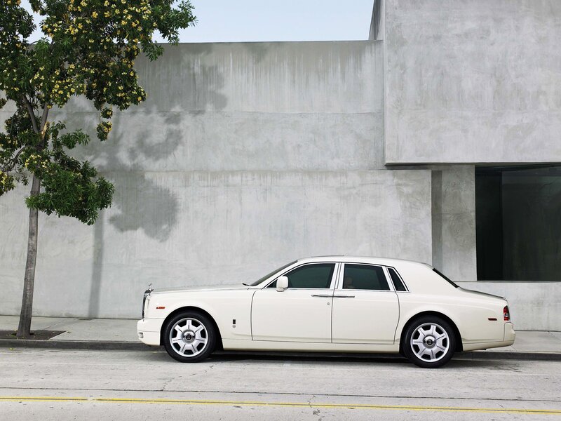 White Rolls-Royce on city street