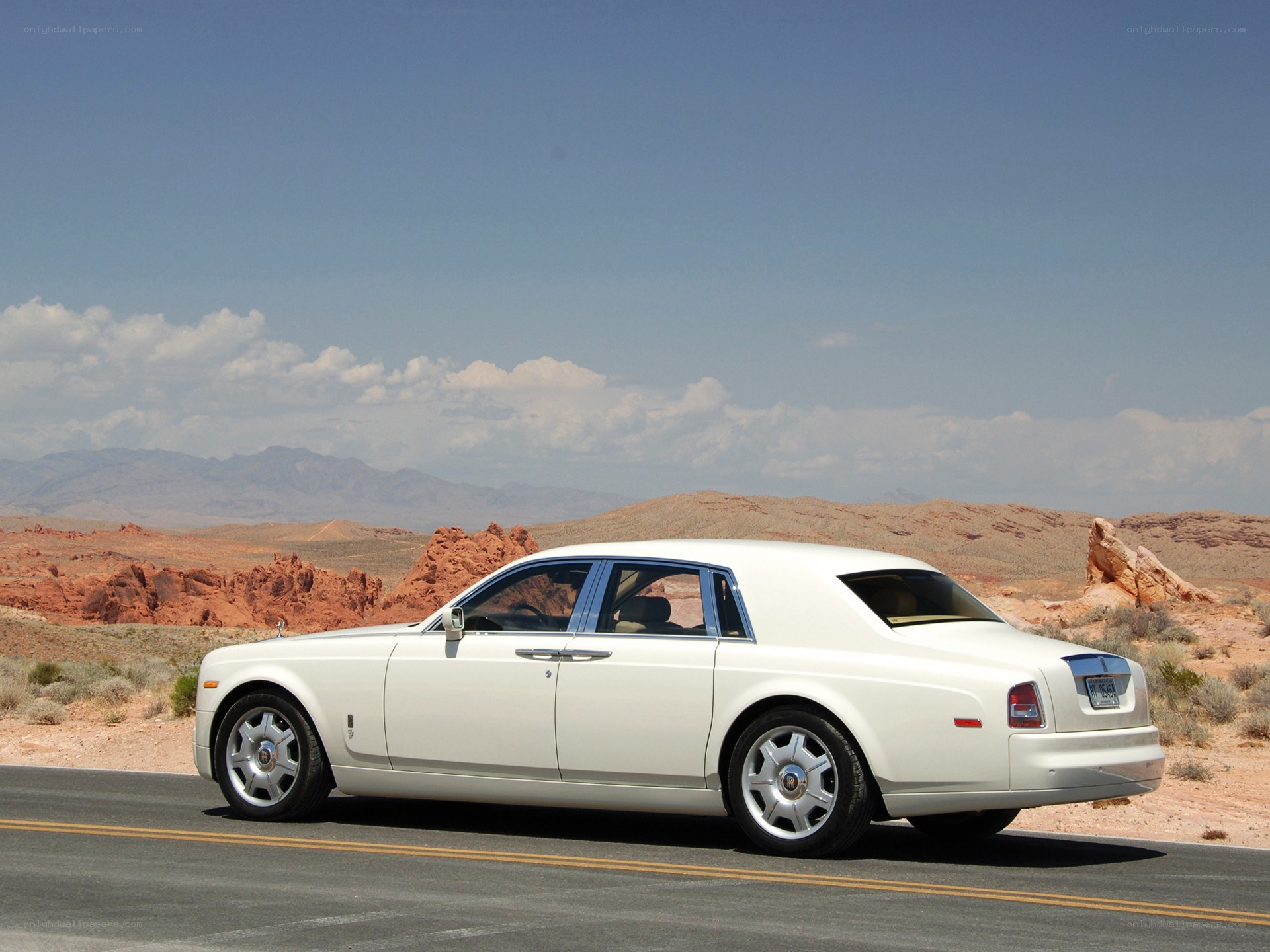 White Rolls-Royce on desert road
