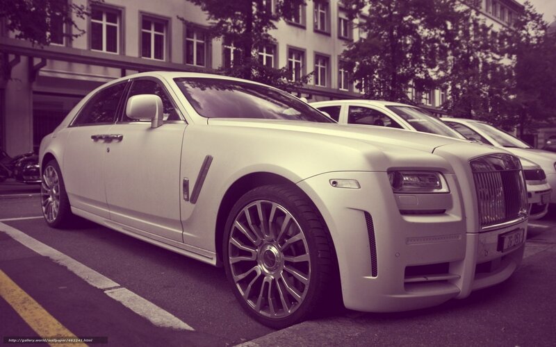 White Rolls-Royce parked on street