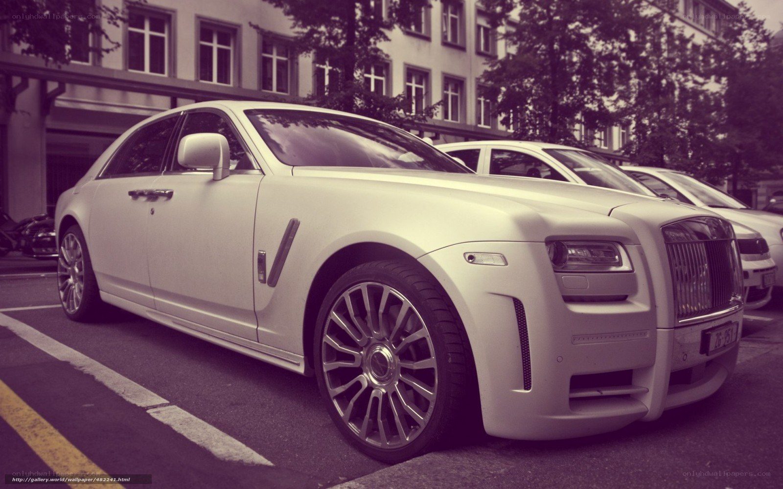White Rolls-Royce parked on street