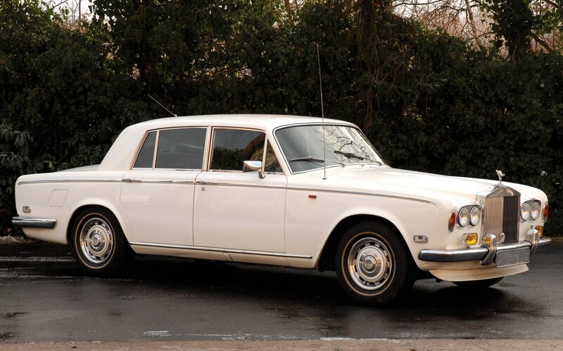 white rolls-royce sedan