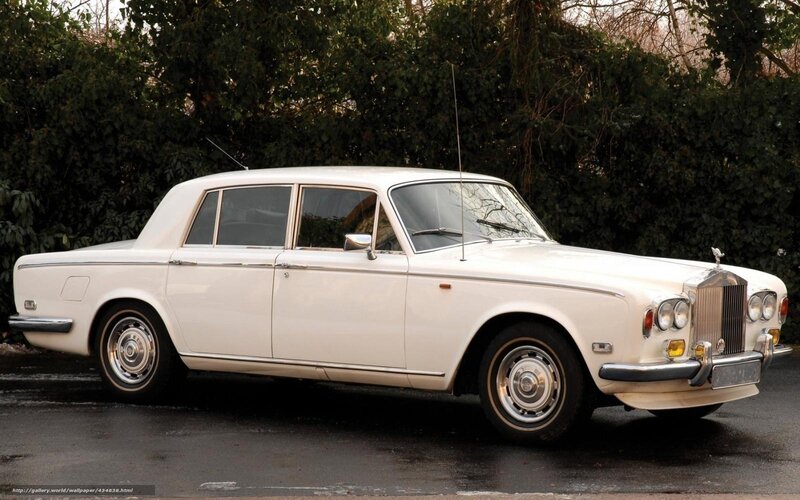 white rolls-royce sedan
