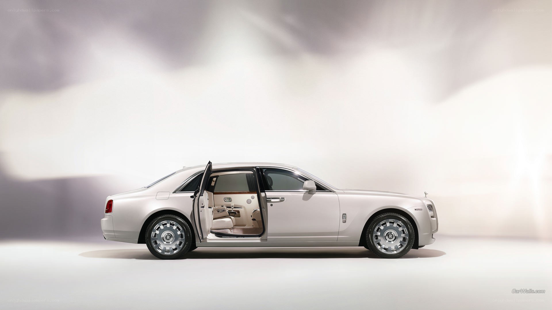 white rolls-royce with open door