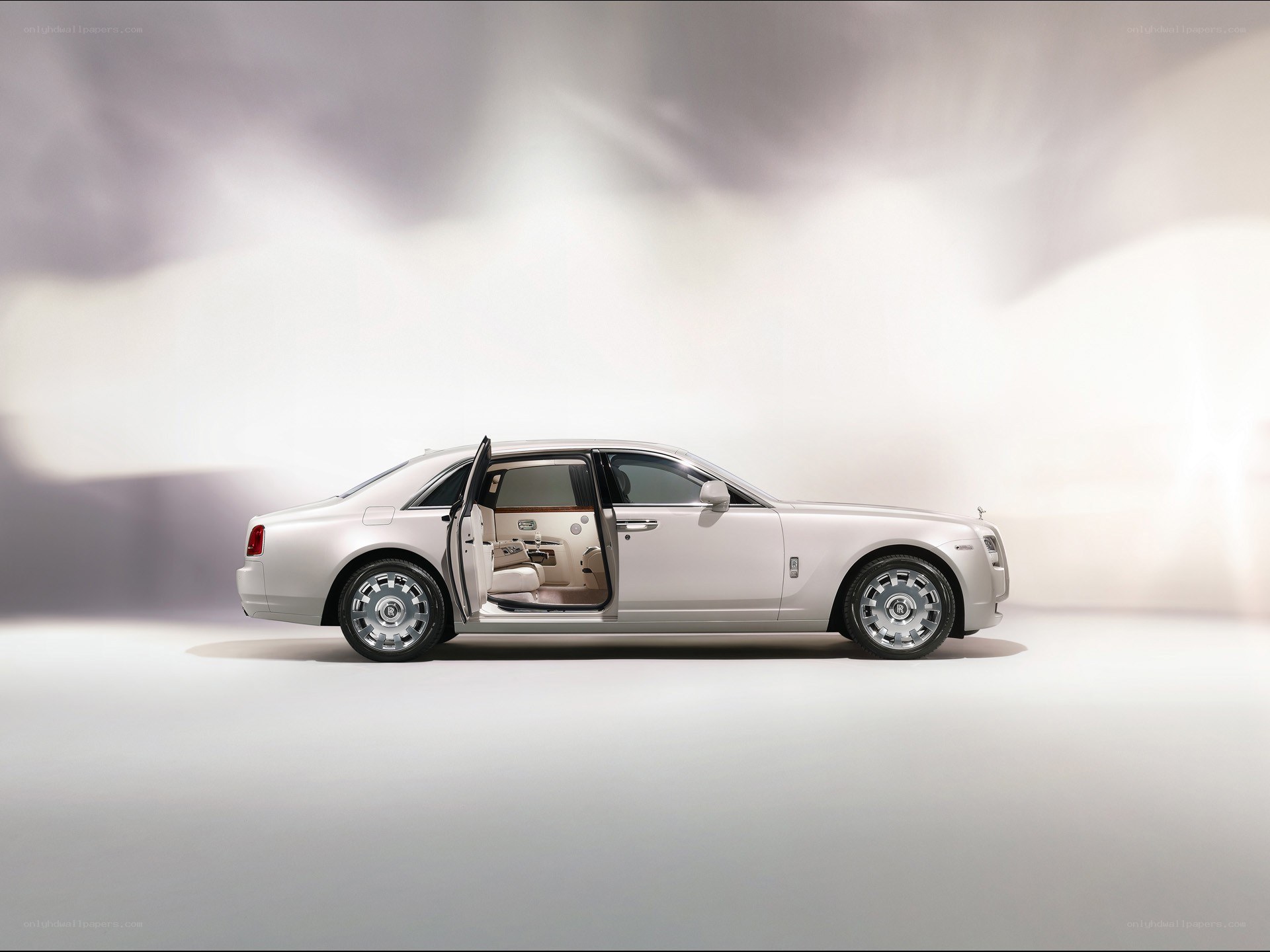 White Rolls-Royce with open door