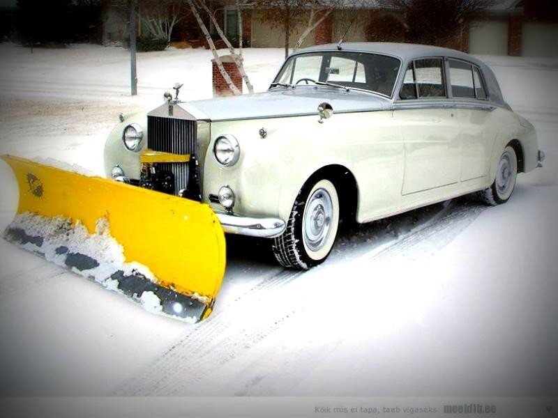 White Rolls-Royce with Snowplow