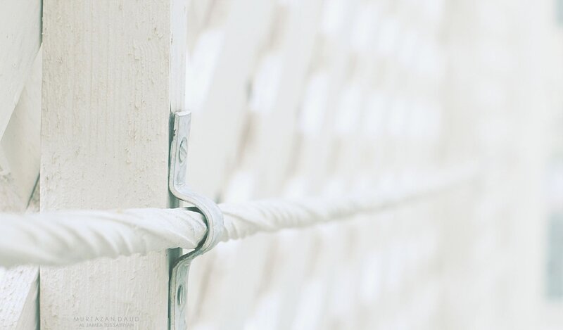 white rope on wooden post