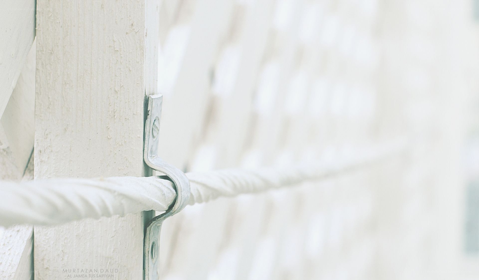 white rope on wooden post