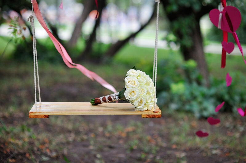 White Rose Bouquet on Swing