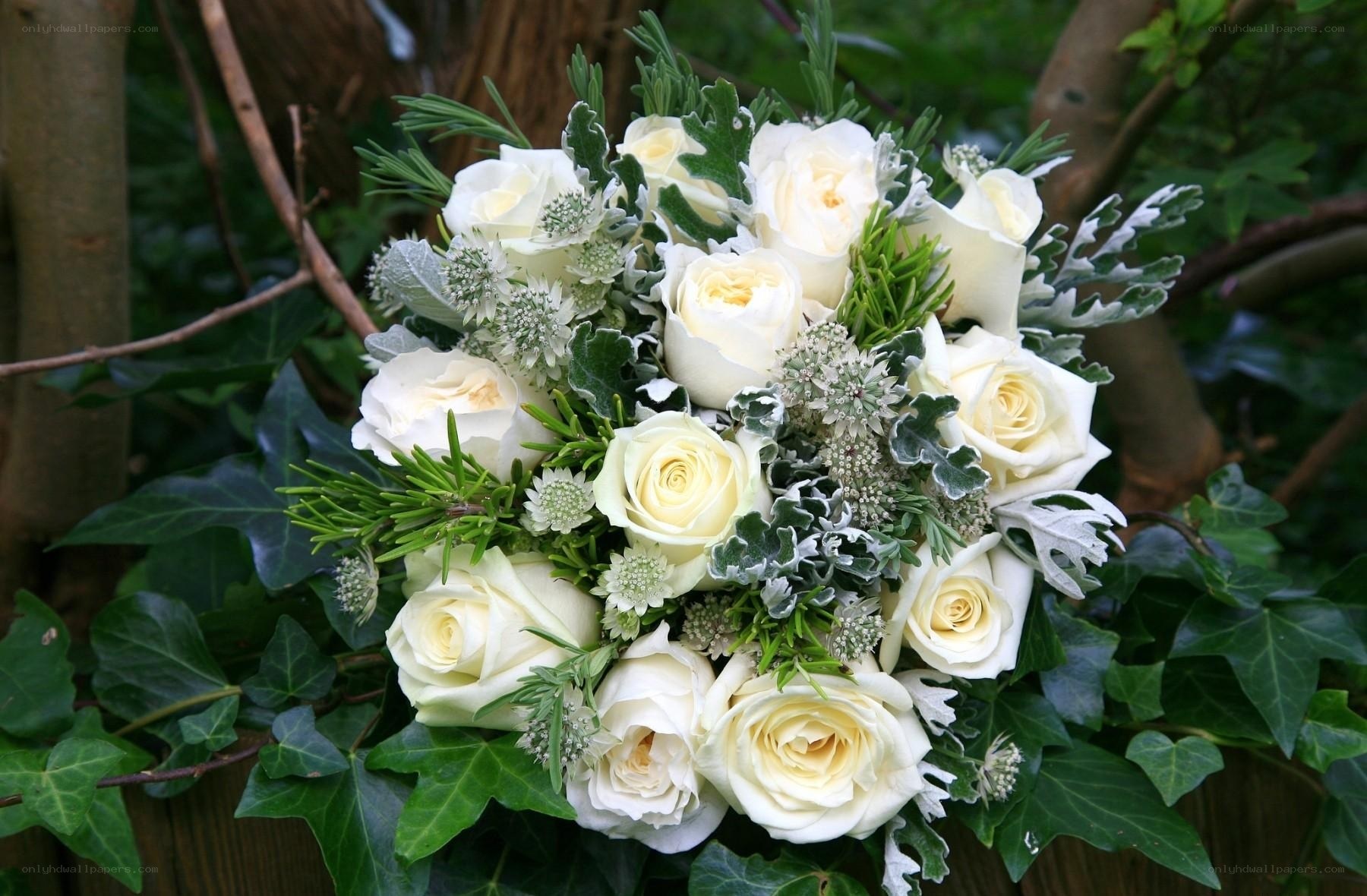 white rose bouquet with greenery