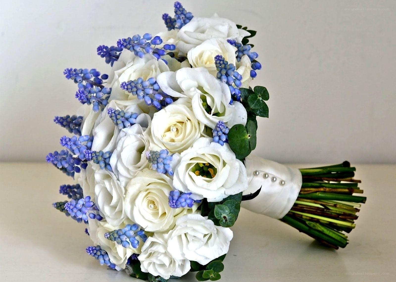 white roses and blue flowers bouquet
