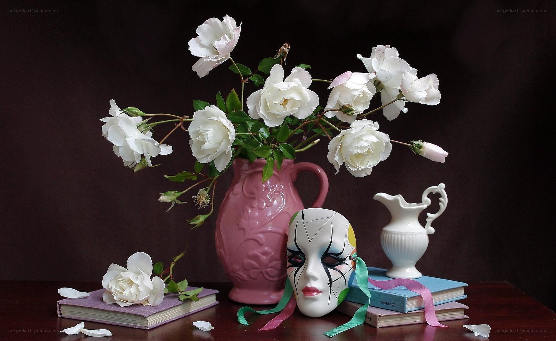 White roses and mask still life