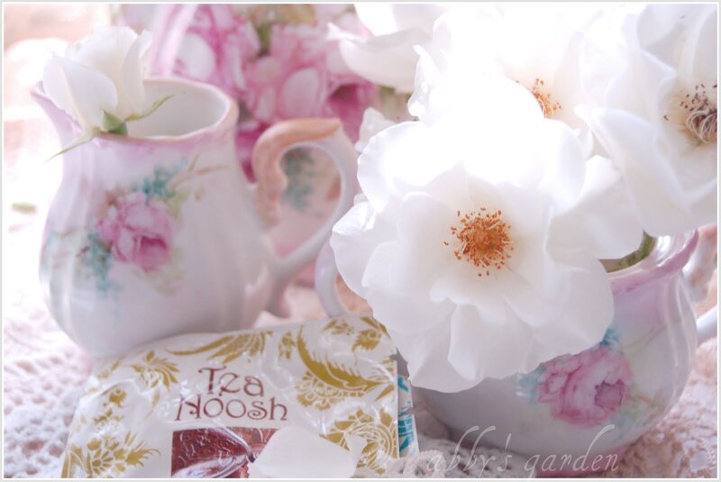 White Roses in Teacups