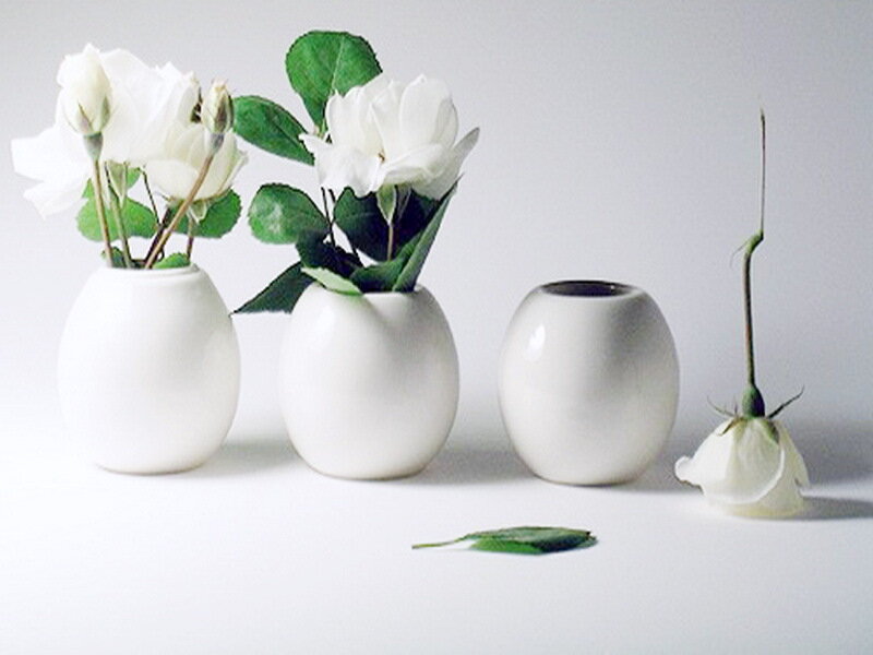 White Roses in Vases