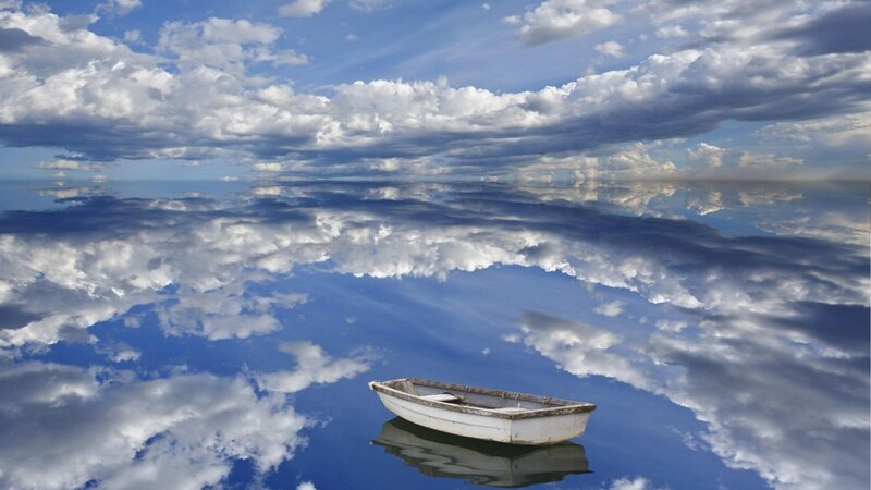 White Rowboat on Water — Blue