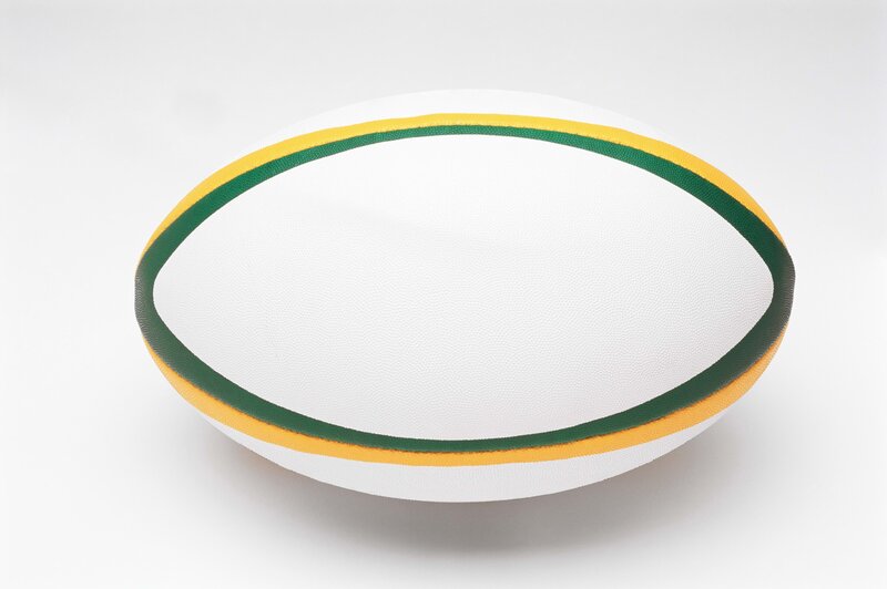 white rugby ball with green and yellow stripes