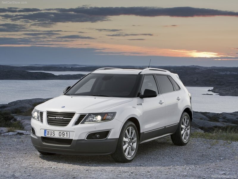 white saab 9-4x at sunset