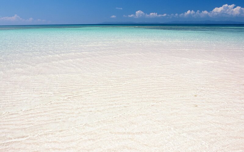 white sand beach with turquoise water