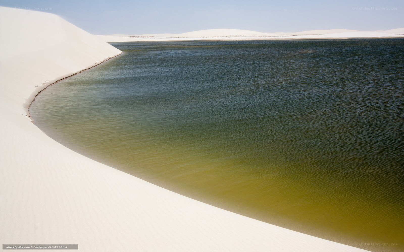 White sand dunes and lake