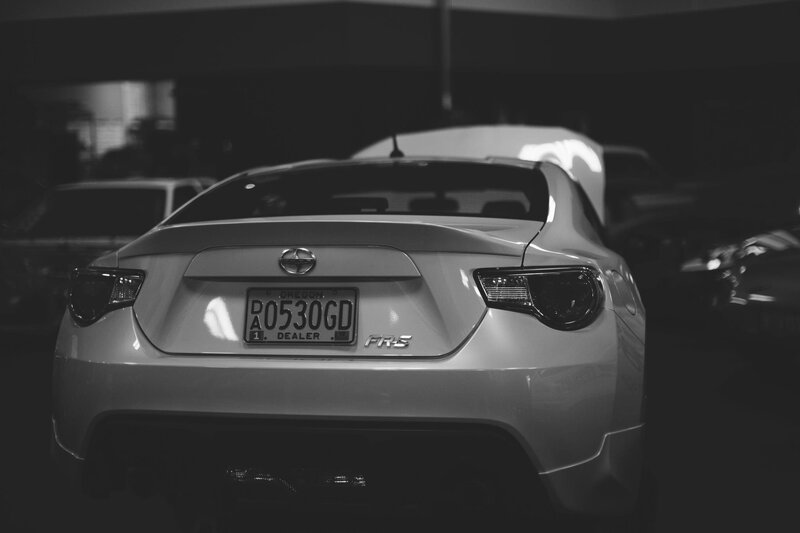 white scion fr-s in parking garage