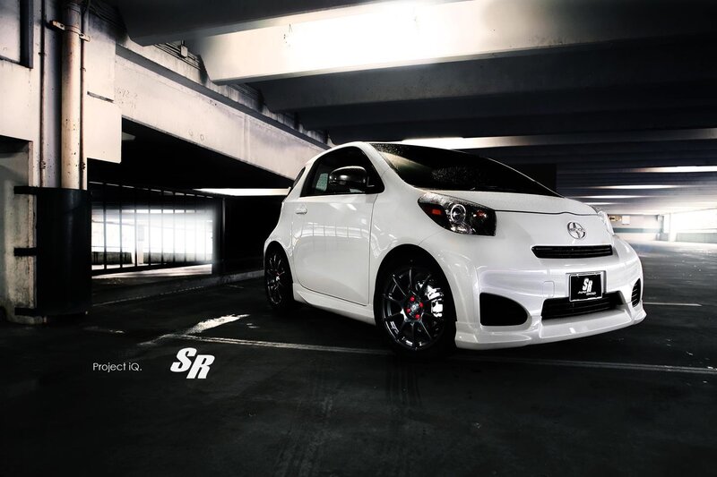 White Scion iQ in parking garage