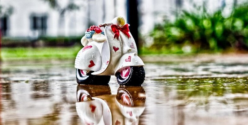 White Scooter Figurine