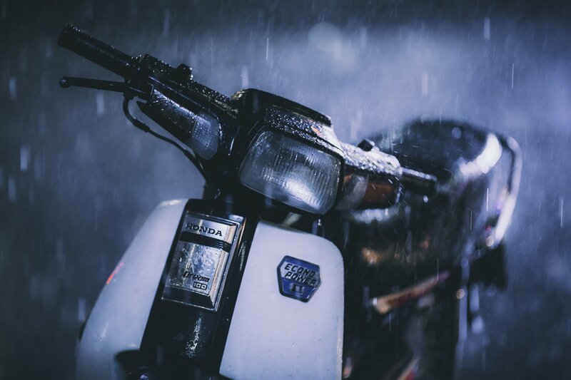 White Scooter in Rain — Blue