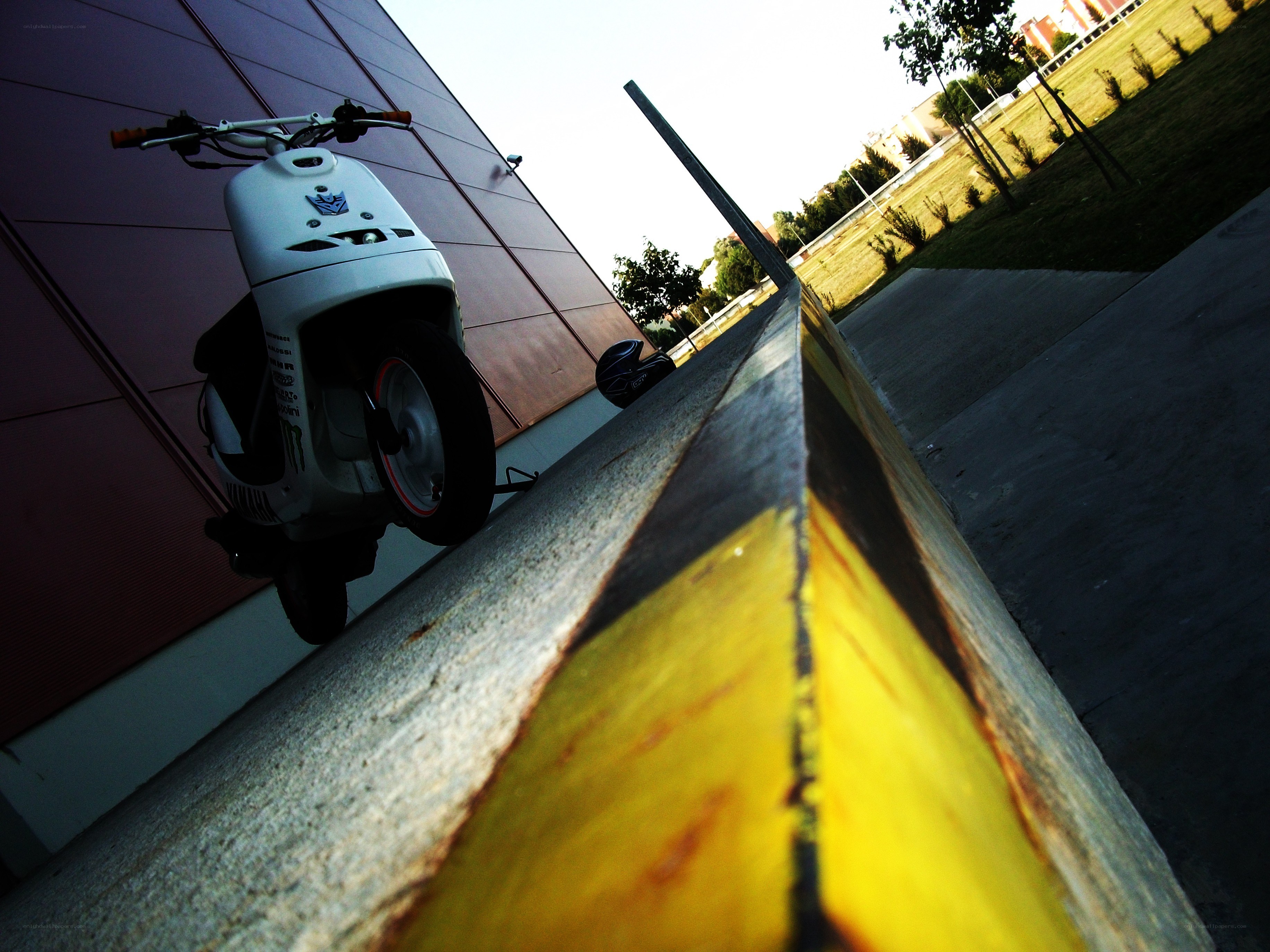 White scooter on a ramp