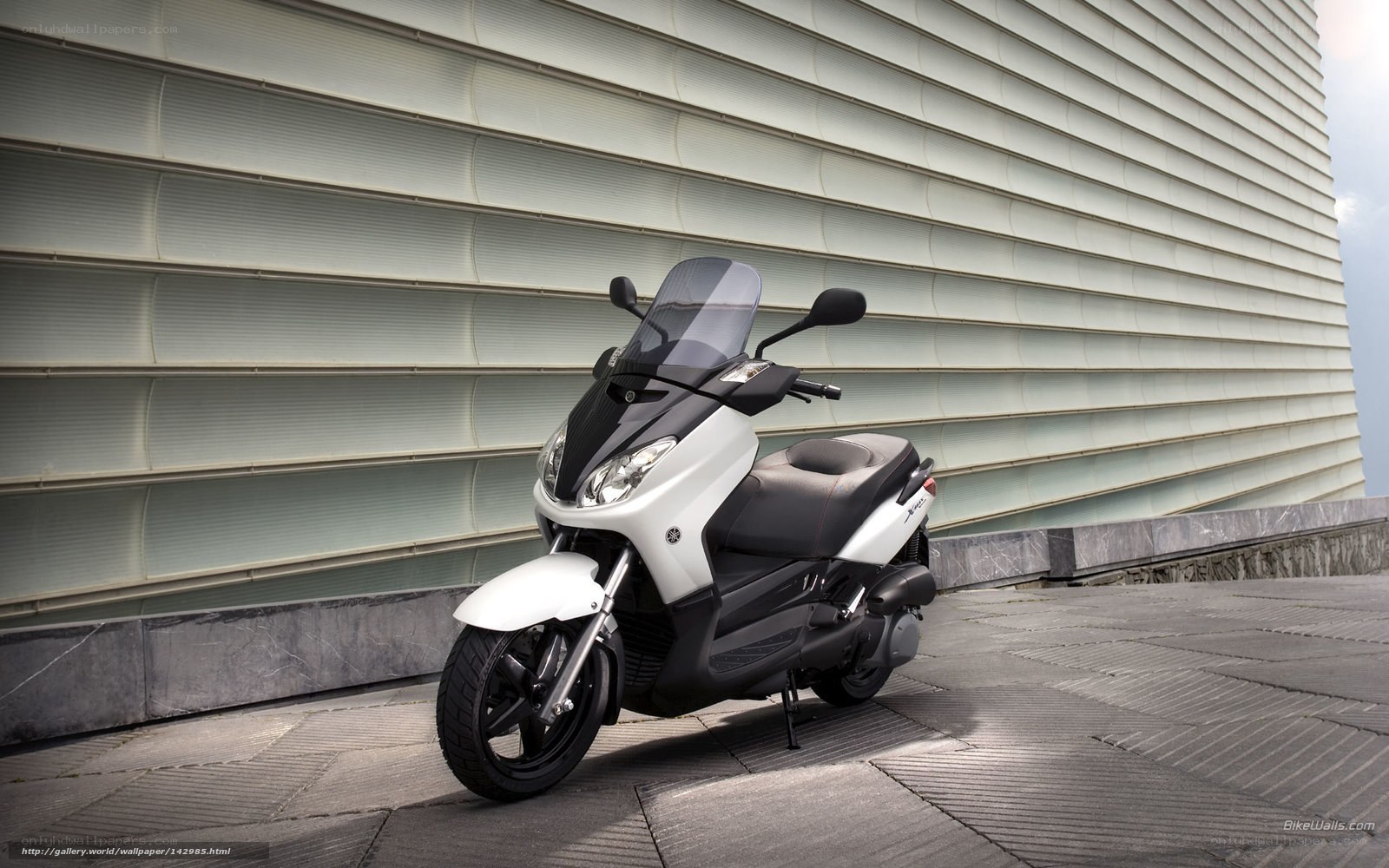 White scooter on city street