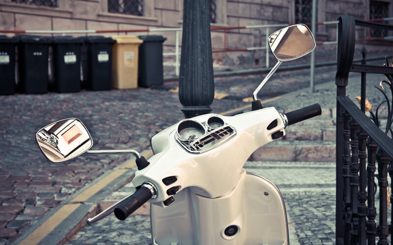White Scooter on Street — Calm