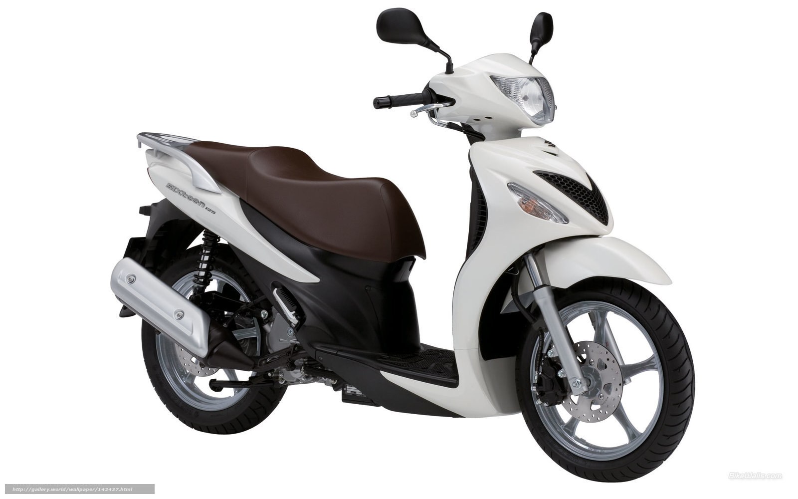 white scooter with brown seat