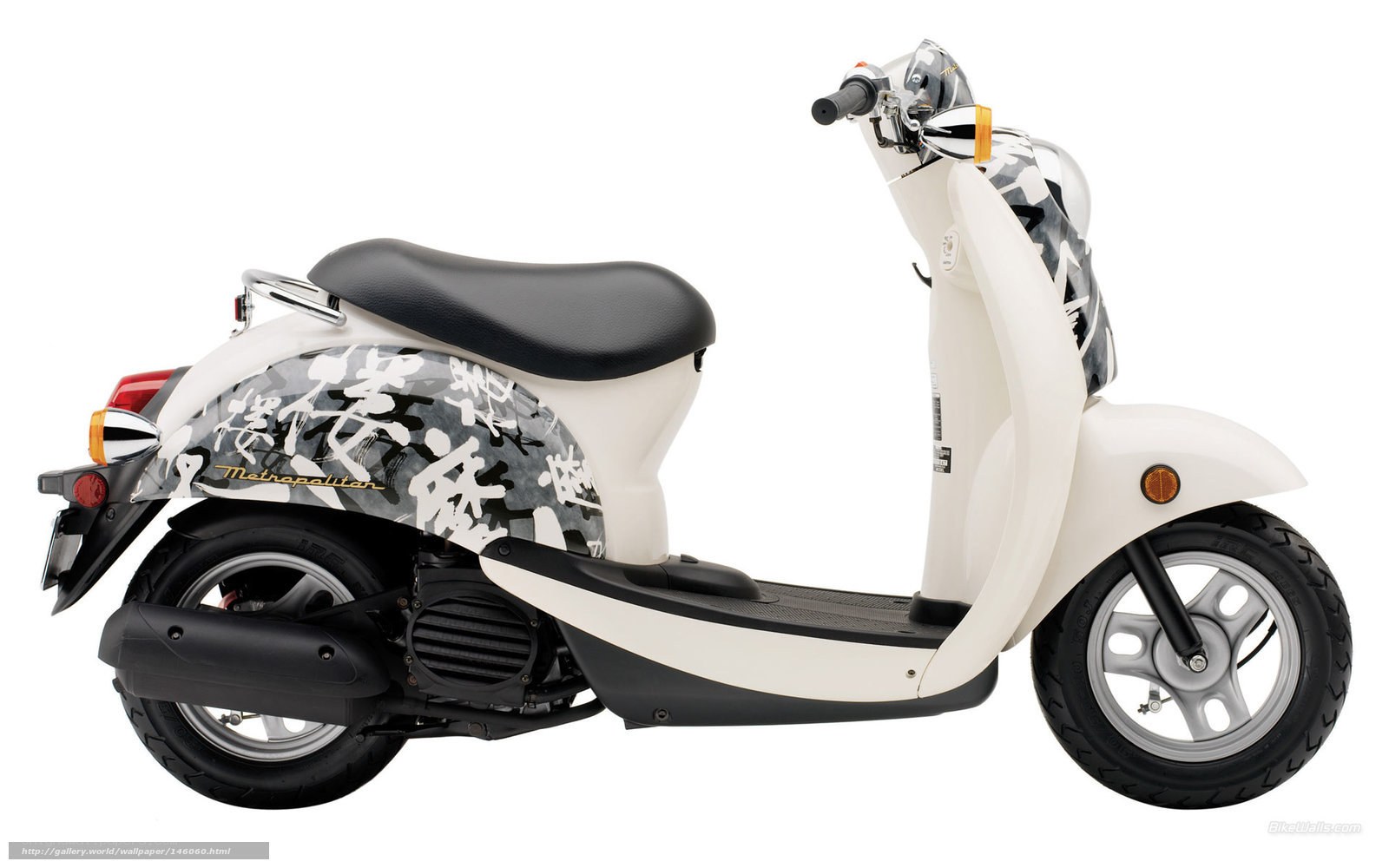 white scooter with graphic design