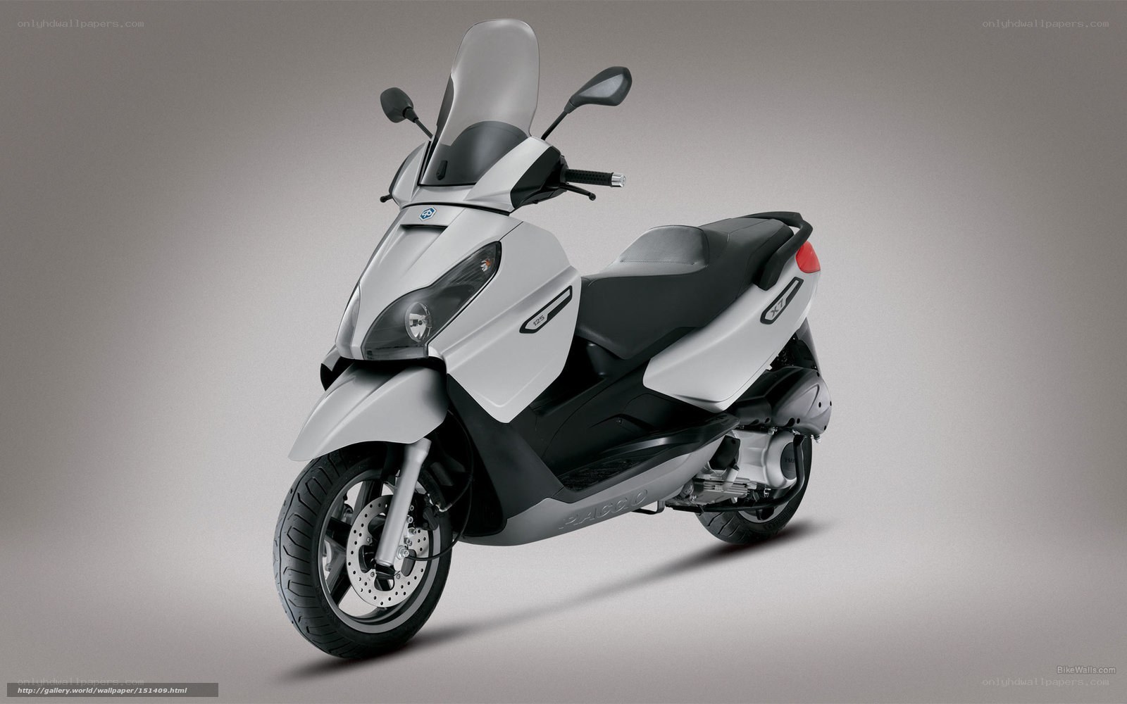 white scooter with windscreen