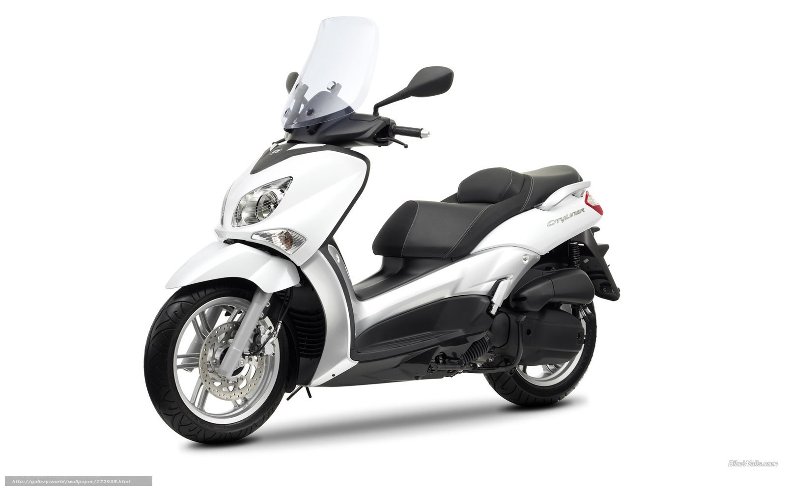 white scooter with windscreen