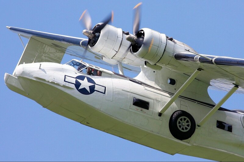 White Seaplane in Flight — Dynamic, Afternoon