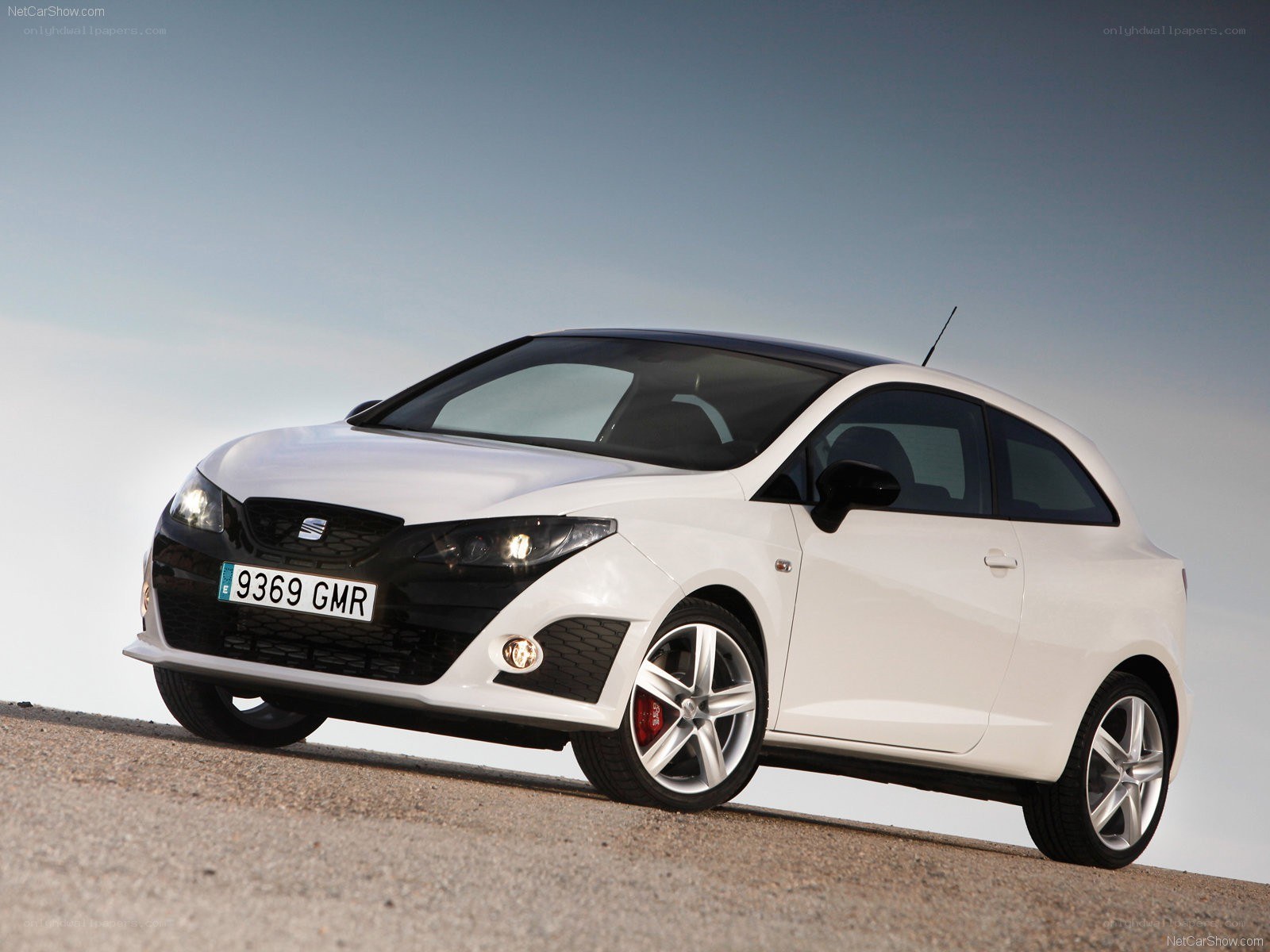 white seat hatchback car