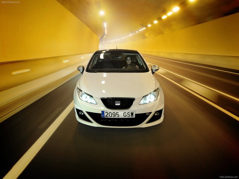 White SEAT Leon driving in tunnel