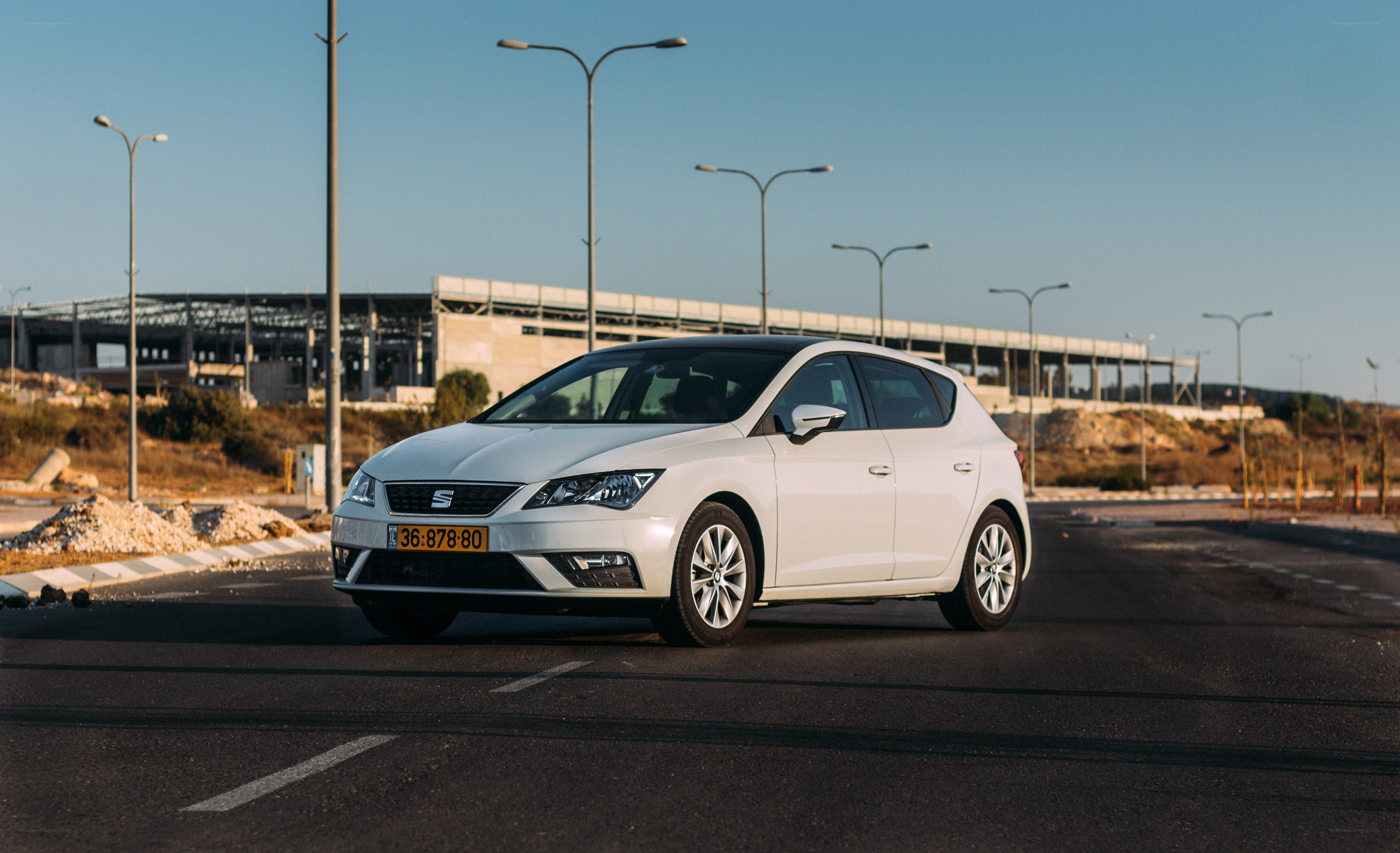 White SEAT Leon parked on road
